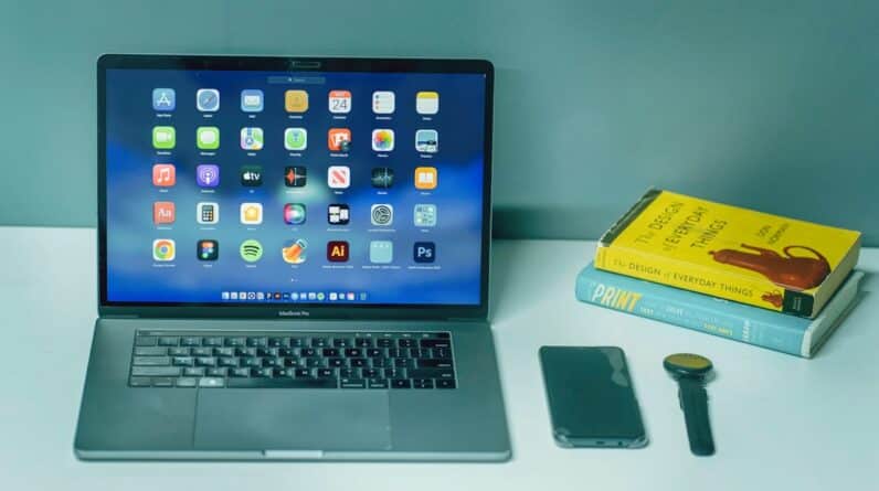 Photo Laptop and textbooks