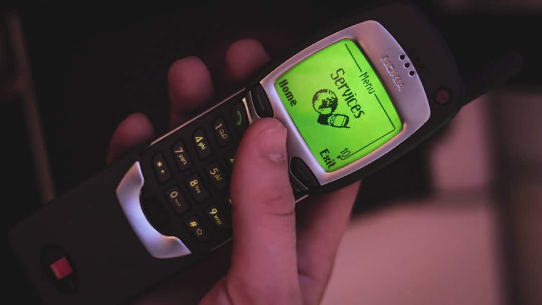 Photo Mobile phone with money icon