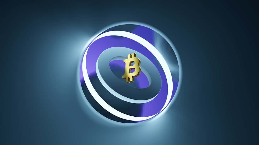 Photo Mobile phone with bitcoin logo