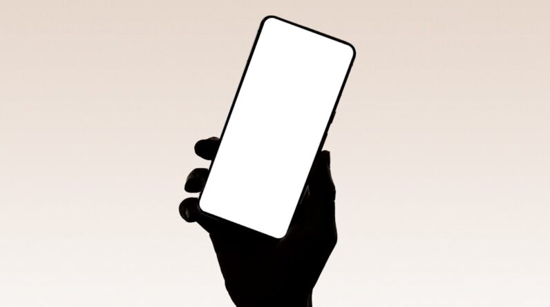 Photo Mobile phone with money icon